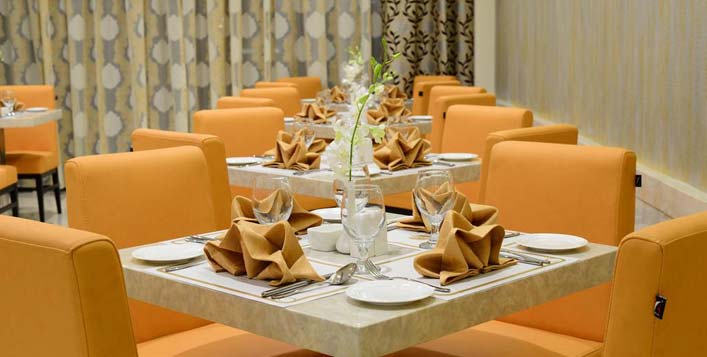 مقهى سينامون، فندق لاندمارك بريميير Landmark Premier Hotel